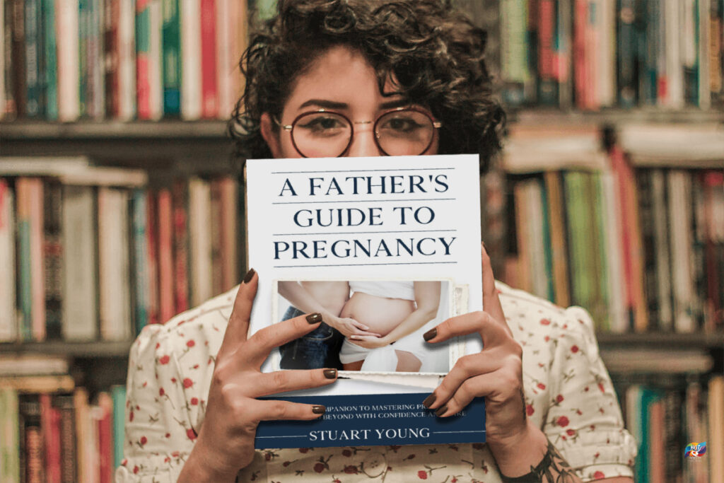 Woman Holding A Father's Guide to Pregnancy